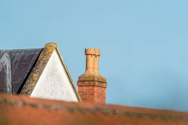 istock Terracotta chimney o top of a building 1285277861