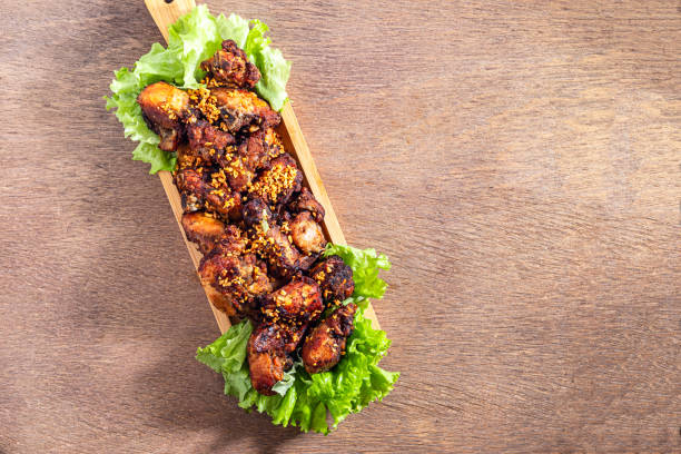 istock Brazilian style deep fried chicken. Called chicken to bird. Top view. Selective focus. Space for text. 1285278987