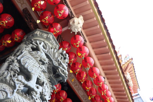 istock Asian temple building. Dragon and  lantern. 1285281388