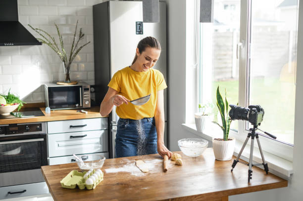 istock A young woman makes cooking videos in the kitchen 1285281580