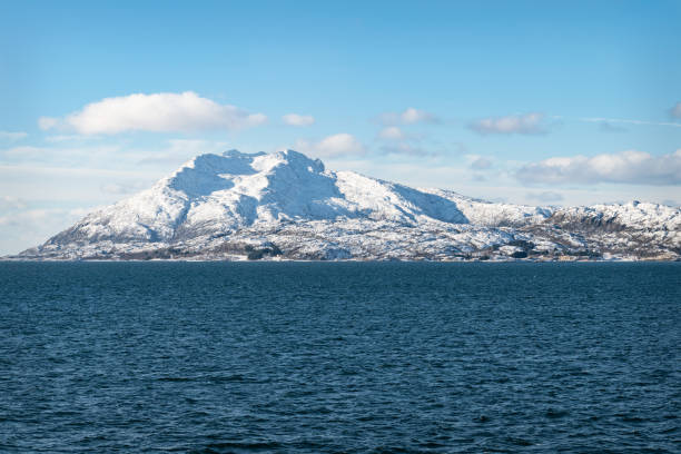 istock Snow covered hills on the Norwegian Coast in winter 1285284463