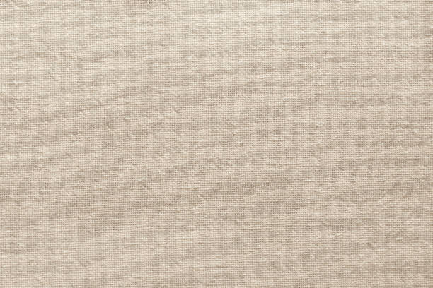 istock Brown cotton fabric texture background, seamless pattern of natural textile. 1285284632