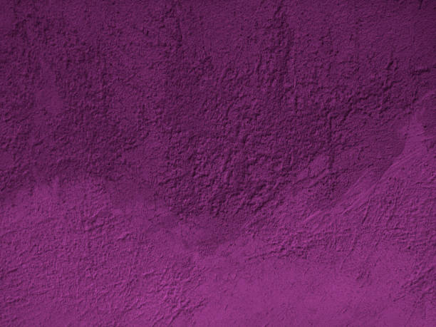 istock Purple stone background. Rough cement texture. Decorative plaster on a concrete wall. 1285286610