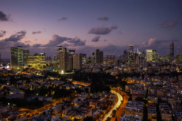 istock Modern office building downtown cityscape skyscraper skyline aerial view night 1285288638