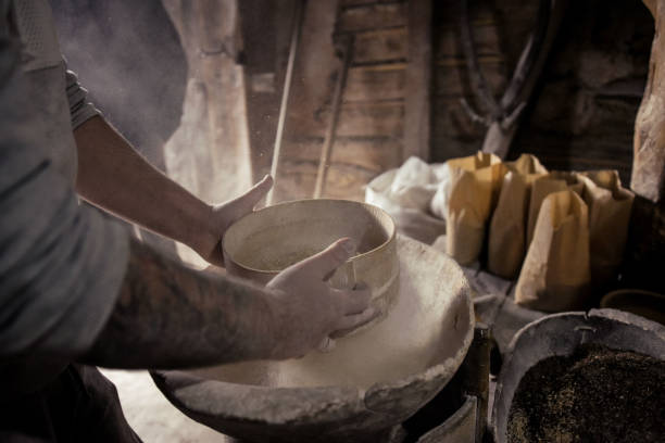 istock sifting homemade flour made on stone 1285288705