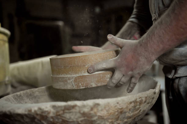 istock sifting homemade flour made on stone 1285288718