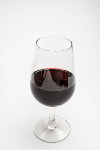 istock Glass of vintage ruby port wine isolated on white background 1285291362