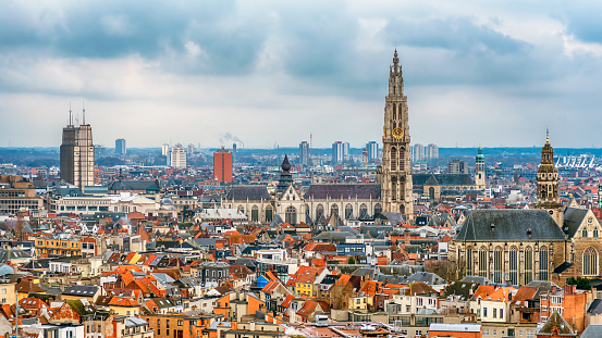 Aerial view of Ghent from Belfry. Saint Nicholas' Church and beautiful medieval buildings. Spring landscape photo. Selective focus with wide angle lens.