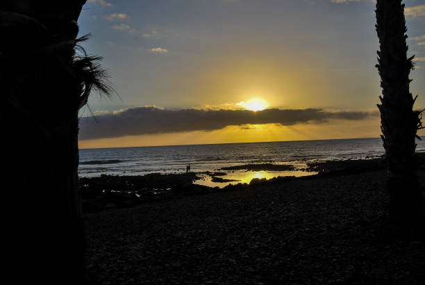 istock sunset on beach, digital photo picture as a background 1285293193