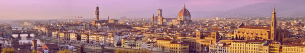 istock Panoramic view of Florence city crossing the river 1285296743
