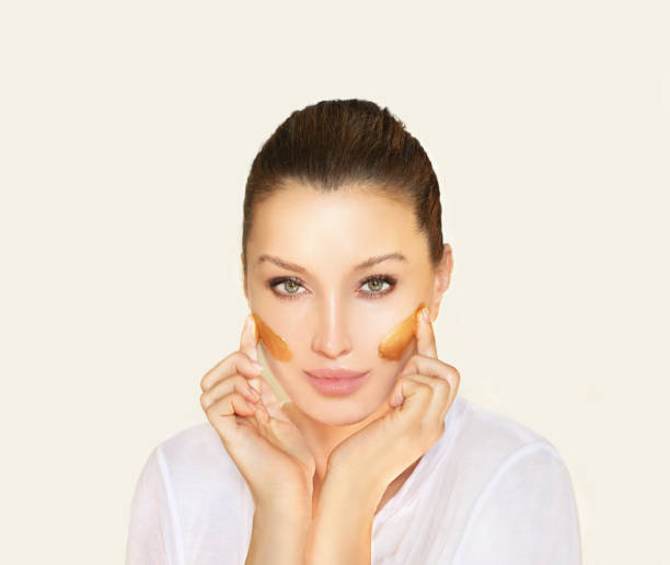 istock Concept of rejuvenation.Volume lifting.Applying the cream 1285298458