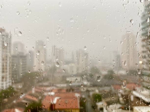 istock Raindrops in the window glass in a storming day 1285299412