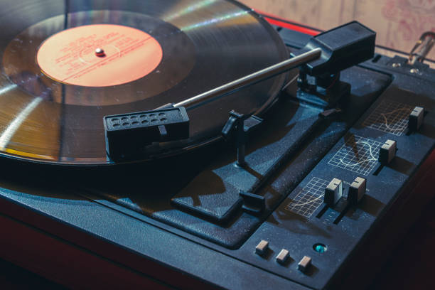 istock Old dusty turntable. Vinyl discs. Retro sketch 1285299991