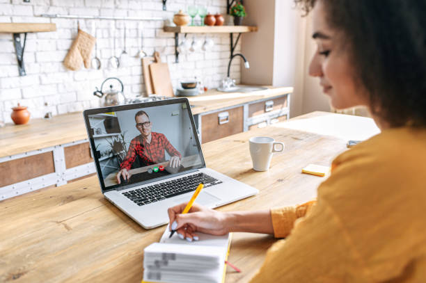 istock An african woman using laptop for video meeting 1285301860