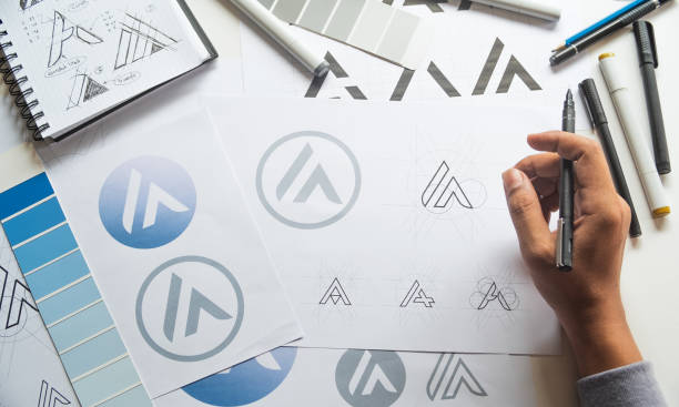 istock Graphic designer creative design sketch drawing logo Trademark brand Workspace 1285303289