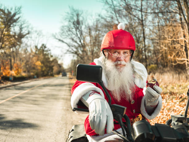 istock Santa Claus taking a break on the road 1285304549