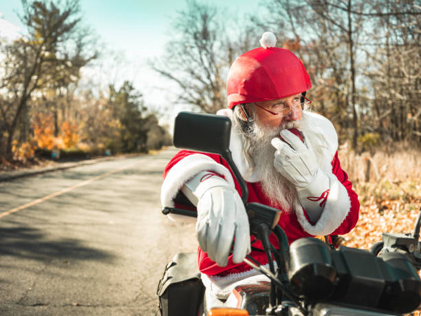 istock Santa Claus taking a break on the road 1285304599