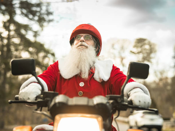 istock Santa Claus on motorbike 1285306419