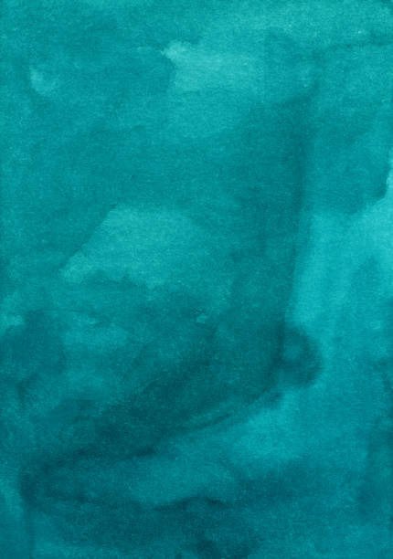 istock Watercolor deep sea green background texture. Aquarelle abstract turquoise backdrop.  Blue-green stains on paper. 1285307403