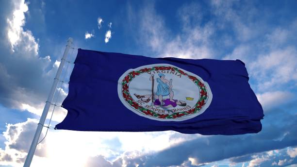 istock Virginia flag on a flagpole waving in the wind, blue sky background. 3d rendering 1285307593