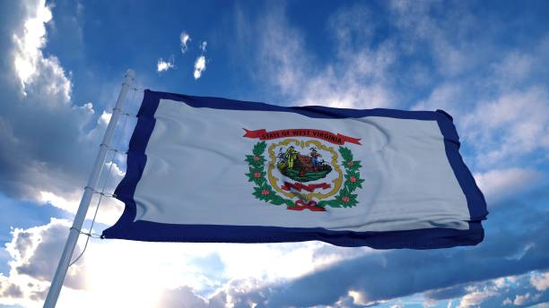 istock West Virginia flag on a flagpole waving in the wind, blue sky background. 3d rendering 1285308212