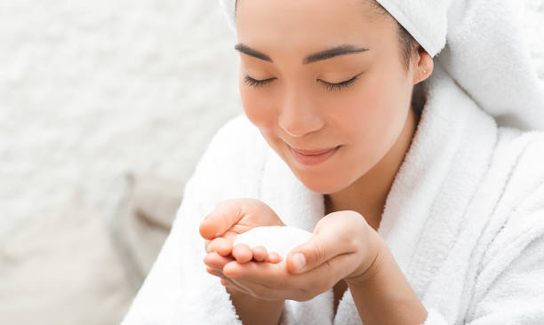 beautiful woman inhales salt air, halotherapy. salt air treatment at the spa - salt room imagens e fotografias de stock