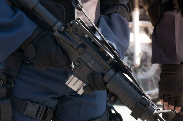 istock Soldier holding a machine with automatic gun.Preparation for military action 1285310076