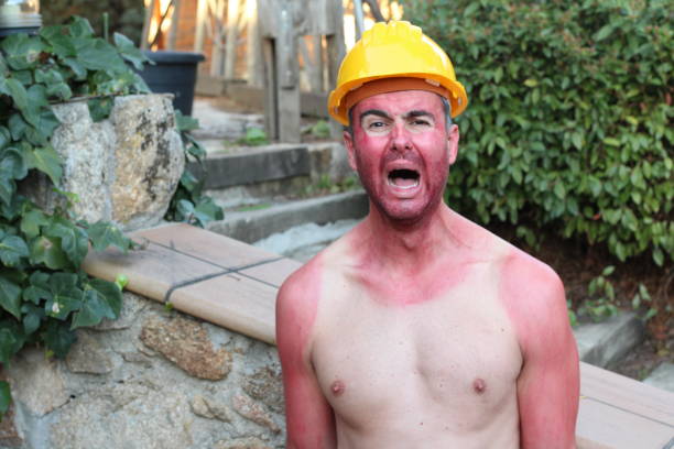 istock Hilarious construction worker with tank top tan lines 1285311383