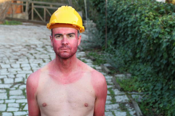 istock Hilarious construction worker with tank top tan lines 1285311481