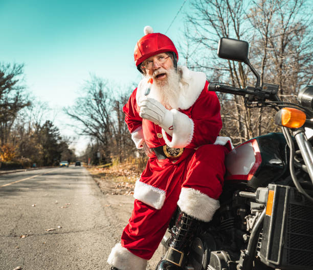 istock Santa Claus taking a break on the road 1285311762