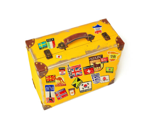 istock Travel suitcase full with destination stickers 1285312453