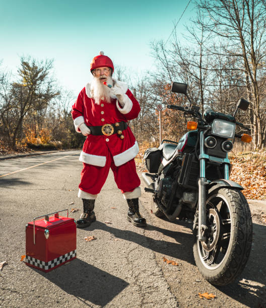 istock Santa Claus taking a break on the road 1285313069