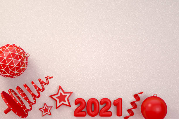 istock 2021 New Year, Christmas Ornaments on White Snow Background 1285313972