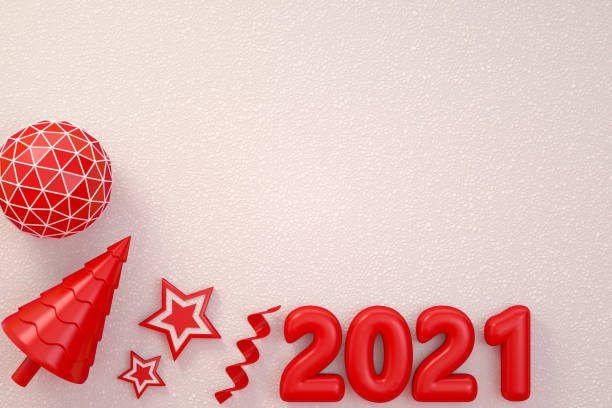 istock 2021 New Year, Christmas Ornaments on White Snow Background 1285314595