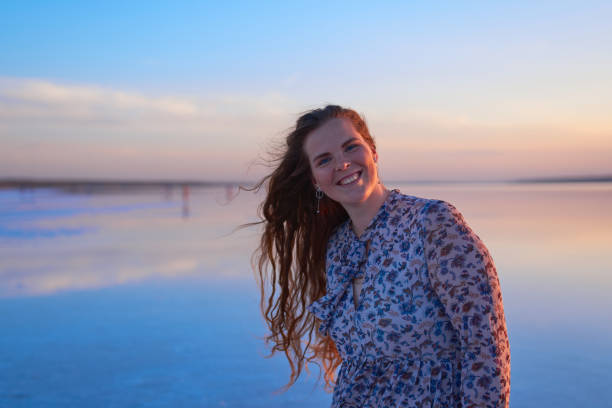 istock Beautiful smiling young woman 1285315364
