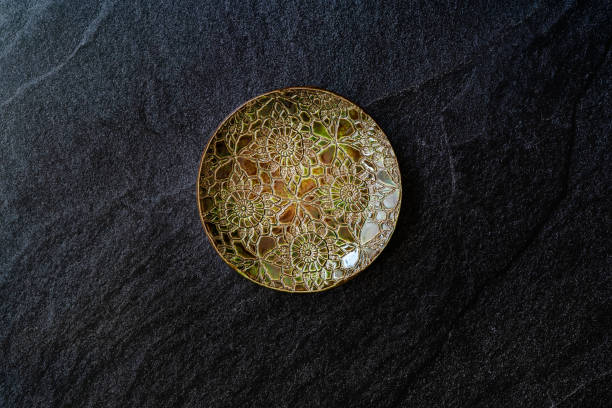 istock Handmade Ceramic Plates and Trays. Handcrafted with Traditional Ottoman Pattern on Dark Surface and Backround / Handicraft. 1285317775