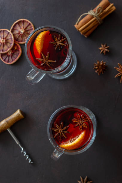 istock Mulled wine with cinnamon and orange. Hot drink. Winter. Recipe. 1285319611