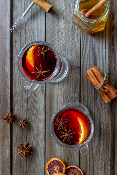 istock Mulled wine with cinnamon and orange. Hot drink. Winter. Recipe. 1285319896