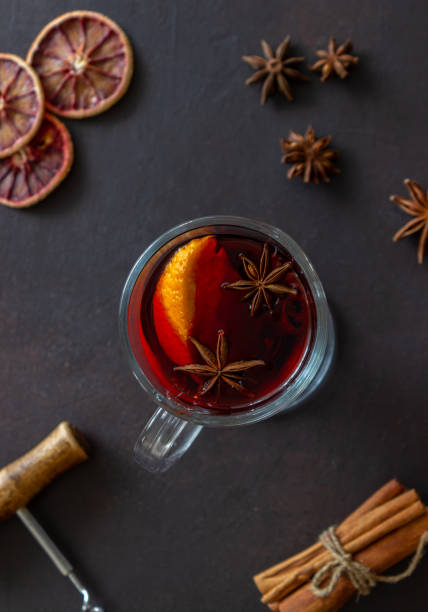 istock Mulled wine with cinnamon and orange. Hot drink. Winter. Recipe. 1285319914