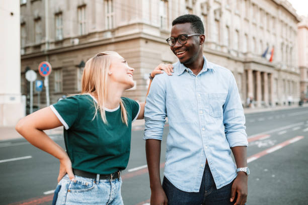 istock Happy Interracial couple having fun together 1285322359