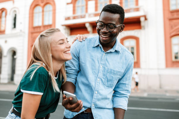 istock Happy Interracial couple having fun together 1285322384