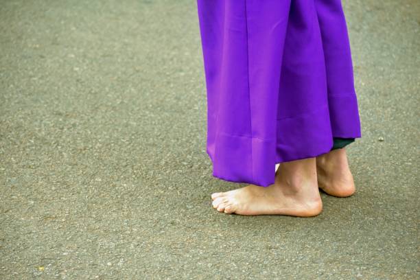 Barefoot pilgrim stock photo