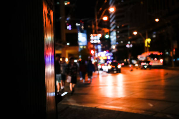 istock Dark blurry background of downtown Toronto streets 1285322795