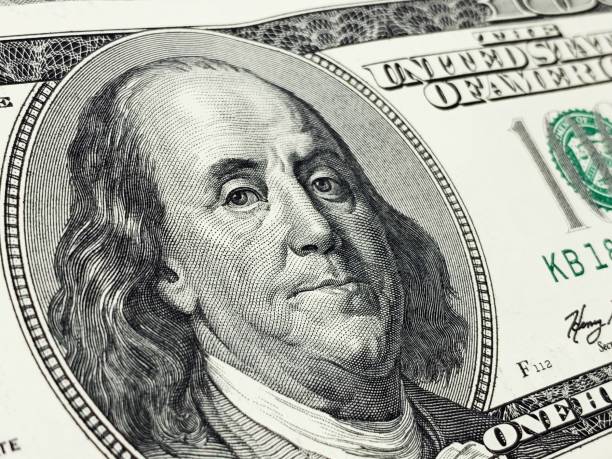 istock one hundred united states dollars and benjamin franklin 1285323797