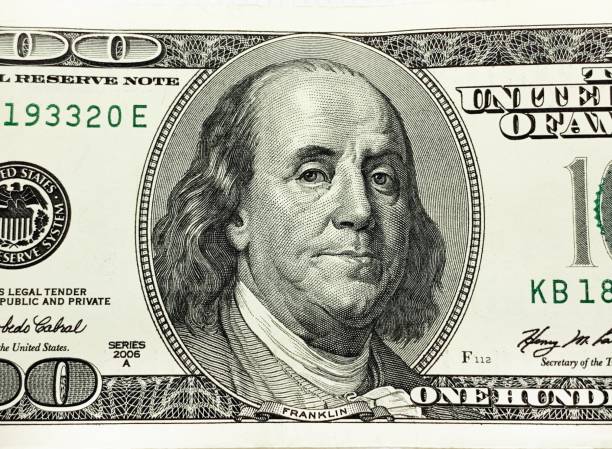 istock one hundred united states dollars and benjamin franklin 1285323892