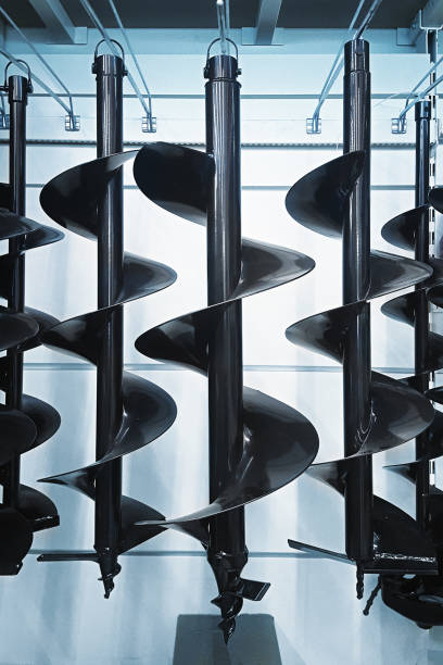 istock Many big black augers on the store stand. Vertical orientation 1285324251