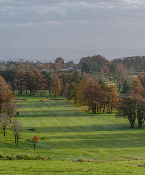 istock View of a golf course hole from the tee box. 1285327760