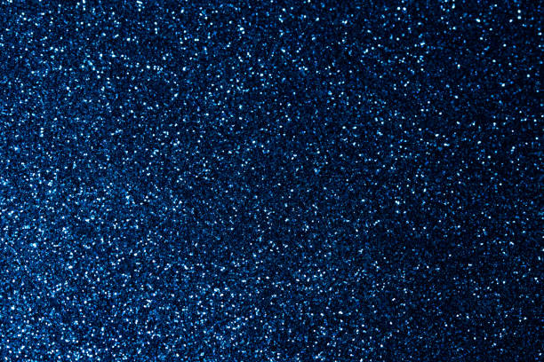 istock Abstract bokeh dark blue with light background.Navy blue color night light elegance,smooth backdrop,artwork design for new year,Christmas sparkling glittering or special day.Selective focus image. 1285327958