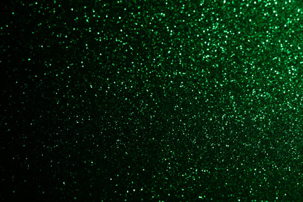 istock Abstract bokeh dark green with light background.Green x mas color night light elegance,smooth backdrop,artwork design for new year,Christmas sparkling glittering or special day.Selective focus. 1285327983