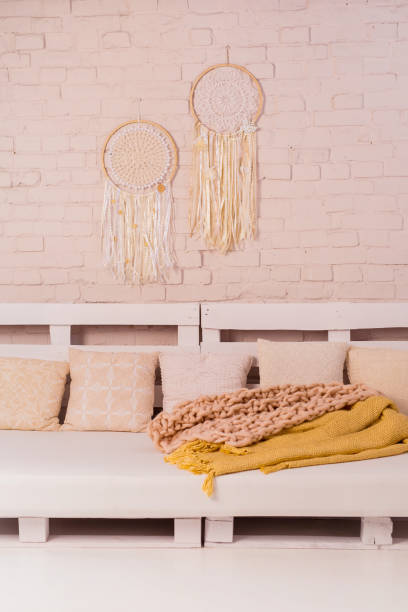 istock Pallet seats closeup with pillows 1285328907